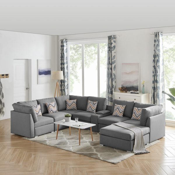 Amira 131.5"W Gray Fabric Reversible Modular Sectional Sofa with USB Console and Ottoman