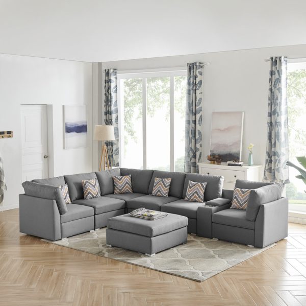 Amira 131.5"W Gray Fabric Reversible Modular Sectional Sofa with USB Console and Ottoman