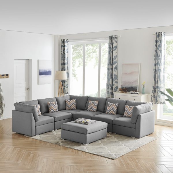 Amira 120.5"W Gray Fabric Reversible Modular Sectional Sofa with Ottoman and Pillows